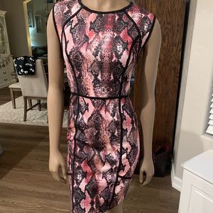 Pink, black and white imitation snake skin print. Size 8, stretchy material.